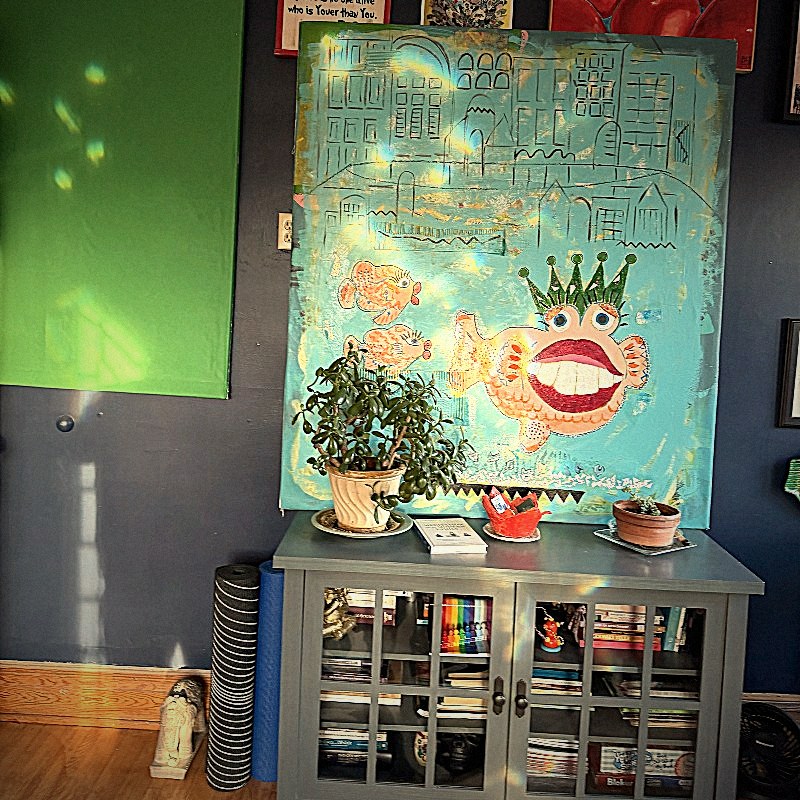 Studio wall with painting and plants